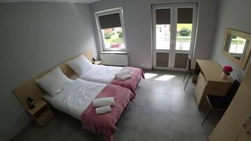 Фото номера Triple Room with Bathroom and Extra Bed Апарт-отели Apartamenty Kozienice г. Козенице 2