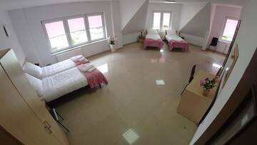 Фото номера Quadruple Room with Bathroom and Extra Bed Апарт-отели Apartamenty Kozienice г. Козенице 13